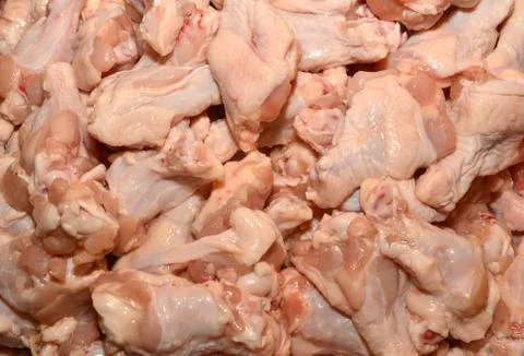 Fresh Raw Chicken Stack at a Market. Stock Photos