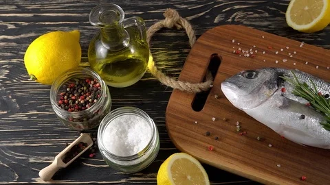 Fresh raw dorado and on table Stock Footage 75166376