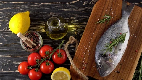 Fresh raw dorado and on table Stock Footage 75166734