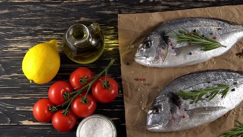 Fresh raw dorado and on table Stock Footage 75166994