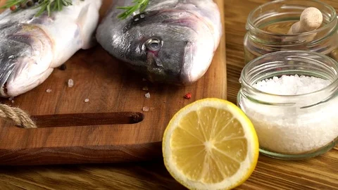 Fresh raw dorado and on table Stock Footage 75168433