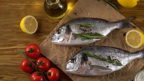 Fresh raw dorado and on table Stock Footage 75168972