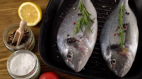 Fresh raw dorado and on table Stock Footage 75213057