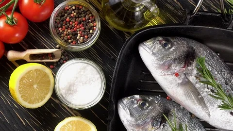 Fresh raw dorado and on table Stock Footage 75631199