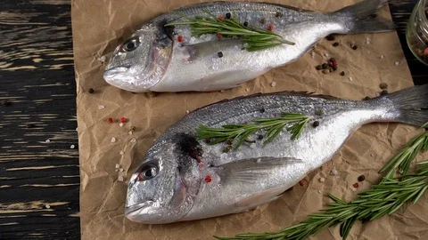 Fresh raw dorado and on table Stock Footage 75634296