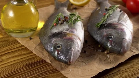 Fresh raw dorado and on table Stock Footage 75638464