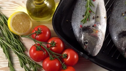 Fresh raw dorado and on table Stock Footage 75751155