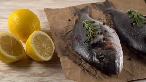 Fresh raw dorado and on table Stock Footage 76555641