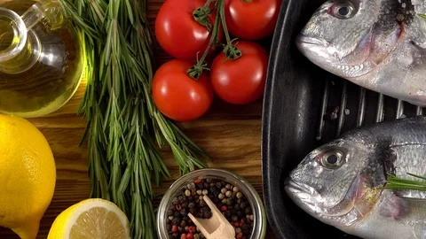 Fresh raw dorado and on table Stock Footage 76557326