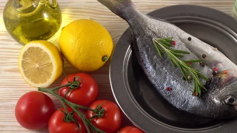 Fresh raw dorado and on table Stock Footage 76649300