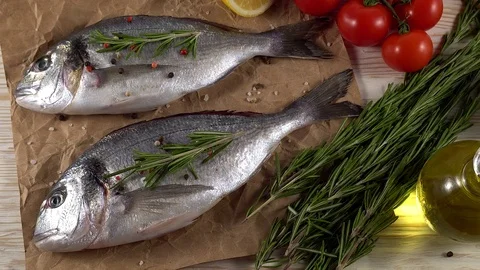 Fresh raw dorado and on table Stock Footage 76650018