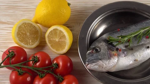Fresh raw dorado and on table Stock Footage 76678036