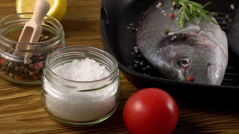 Fresh raw dorado and on table Stock Footage 76679647