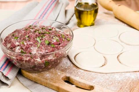 Fresh raw dough and beef forcemeat Stock Photos