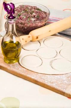 Fresh raw dough and beef forcemeat Stock Photos