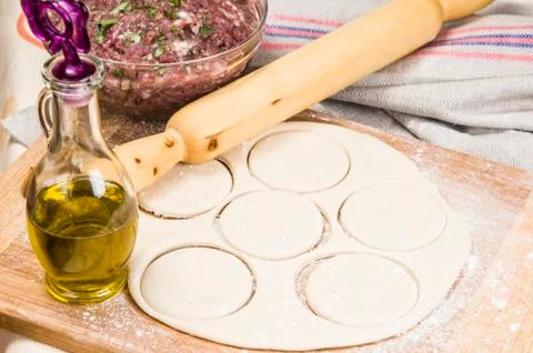 Fresh raw dough and beef forcemeat Stock Photos
