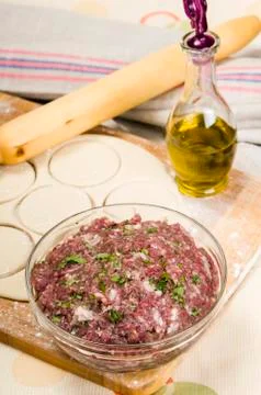 Fresh raw dough and beef forcemeat Stock Photos
