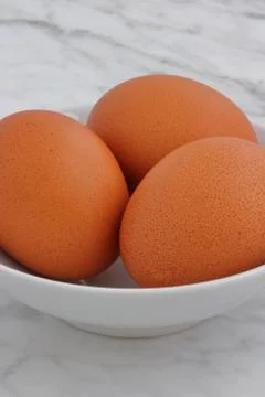 Fresh raw eggs Stock Photos