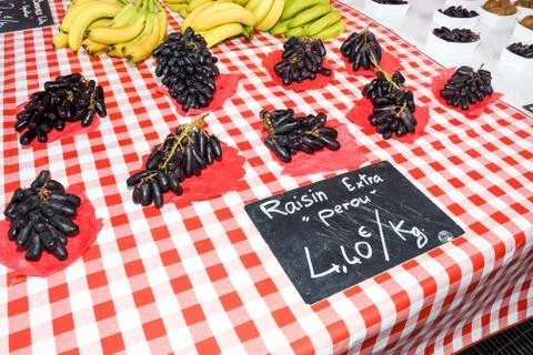 Fresh raw extra large Jumbo Raisons grapes for sale at the Nice outdoor marke Stock Photos