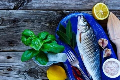 Fresh raw fish Stock Photos