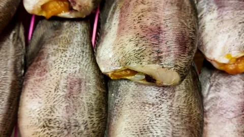 Fresh Raw Fish Prepared for Frying Street Food Seafood Close Up, 4K Stock Footage 331984258