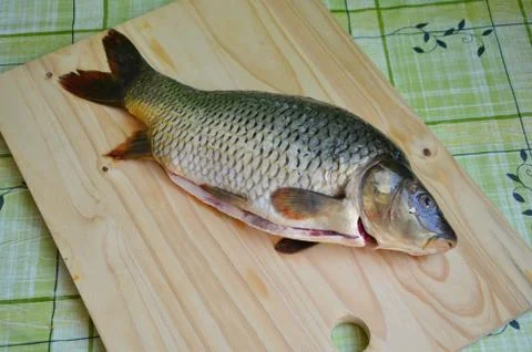 Fresh raw fish on the table Stock Photos