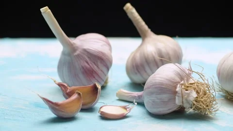 Fresh raw garlic on the table Stock Footage 140400696