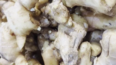 Fresh Raw Ginger Roots Pile Macro Shot Stock Footage 334338946