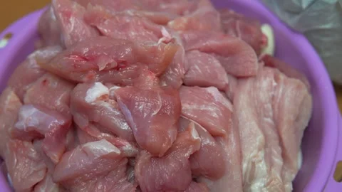 Fresh Raw Meat Chunks in Purple Bowl for Market or Kitchen Use Video stock 328353963