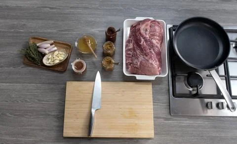 Fresh raw meat on kitchen table Stock Photos