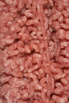 Fresh raw minced mixed meat texture in a vertical full frame background Stock Photos