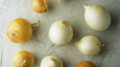 Fresh raw onions on the table Stock Footage 140373825