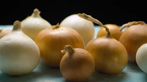 Fresh raw onions on the table Stock Footage 140400485