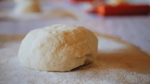 Fresh raw pizza or bread dough is on the table Stock Footage 95802869