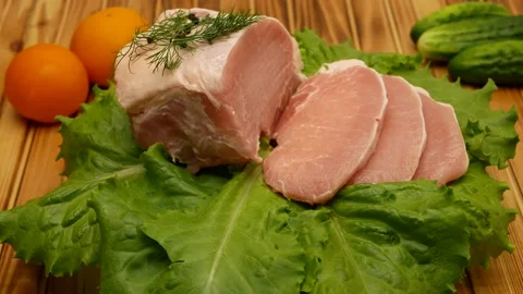 Fresh raw pork meat close-up. Preparing for frying. Pork steak. Rotation. The Stock Footage 201885022