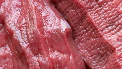 Fresh raw red beef meat slices circle rotation close up top view Stock Footage 262229040