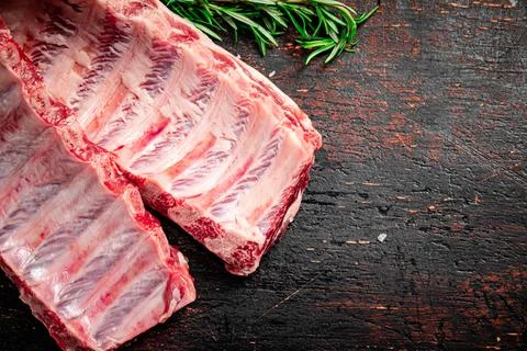 Fresh raw ribs on the table. Stock Photos