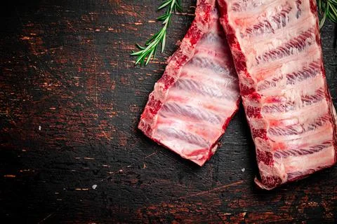 Fresh raw ribs on the table. Stock Photos