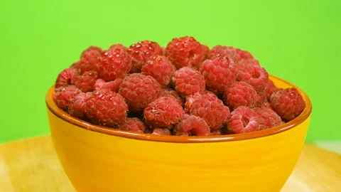 Fresh raw ripe red raspberry in plate, closeup Stock Footage 157205439
