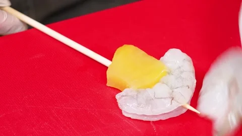 Fresh Raw Shrimp Skewer with Pineapple Slice on Red Background 库存影片 337440644
