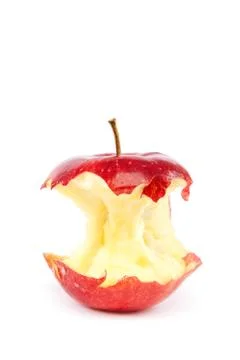 Fresh red apple core on white background. Stock Photos
