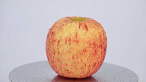 Fresh red apple(rotating) isolated on white background. Stock Footage 243630294