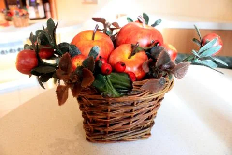Fresh red apples in a basket on the table as a decoration Stock Photos