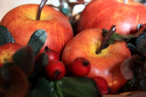 Fresh red apples in a basket on the table as a decoration Stock Photos