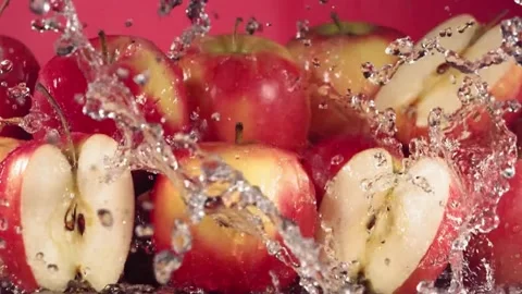 Fresh red apples being splashed with water closeup. Stock Footage 335711134