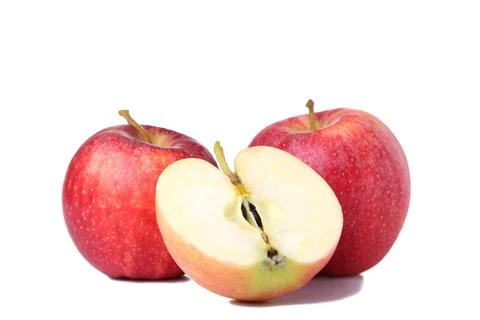Fresh red apples isolated on white. Apple slice on white background Stock Photos