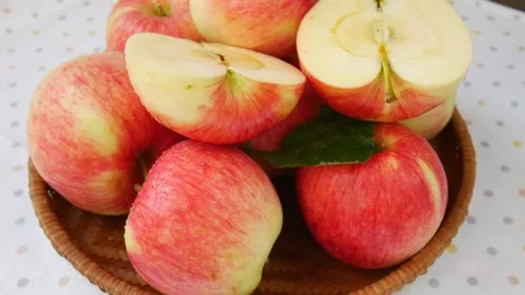 Fresh red apples rotating in a basket. Stock Footage 306583433