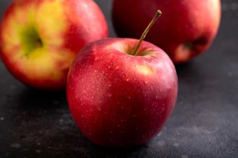 Fresh Red apples on rustic black background Stock-Fotos