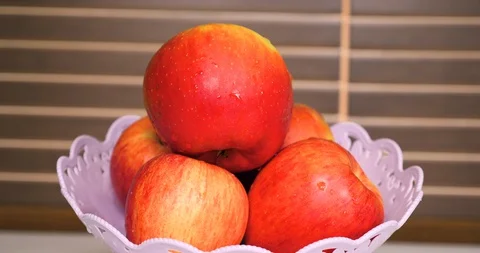 Fresh red apples on the table in kitchen Stock Footage 129092106