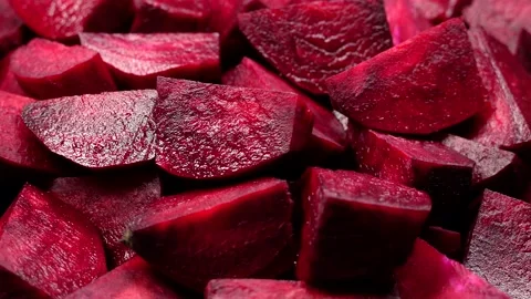 Fresh red beetroot slice rotation background Stock Footage 169512429